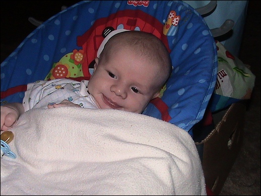 Evan in his bouncy chair