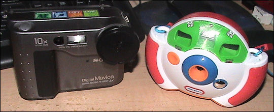 My first digital camera and my son's first digital camera - equals