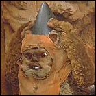 An Ewok in a party hat